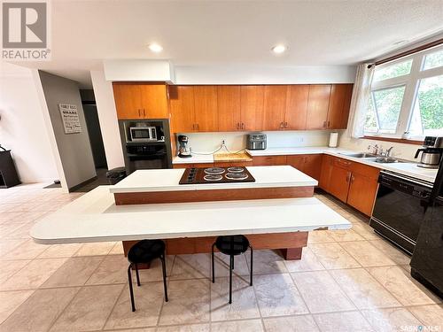 220 Ash Drive, Weyburn, SK - Indoor Photo Showing Kitchen With Double Sink