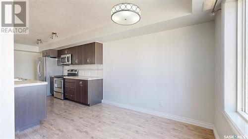 305 5303 Universal Crescent, Regina, SK - Indoor Photo Showing Kitchen