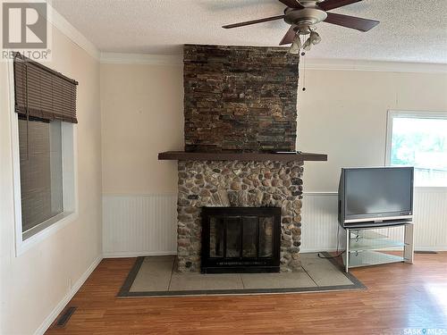 307 Center Street, Cabri, SK - Indoor Photo Showing Living Room With Fireplace