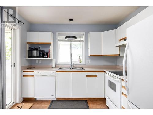 2440 Old Okanagan Highway Unit# 142, West Kelowna, BC - Indoor Photo Showing Kitchen With Double Sink