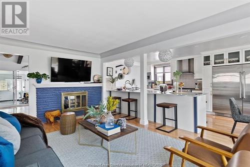 6725 Riverside Drive East, Windsor, ON - Indoor Photo Showing Living Room With Fireplace