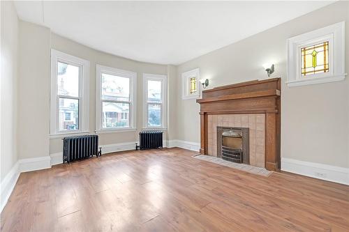 100 Balsam Avenue S, Hamilton, ON - Indoor Photo Showing Living Room With Fireplace