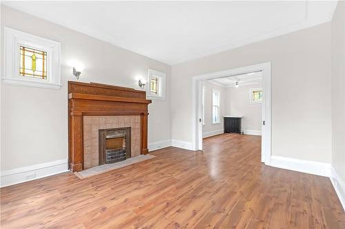 100 Balsam Avenue S, Hamilton, ON - Indoor Photo Showing Living Room With Fireplace