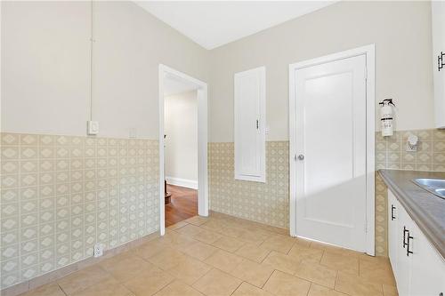 100 Balsam Avenue S, Hamilton, ON - Indoor Photo Showing Kitchen With Double Sink