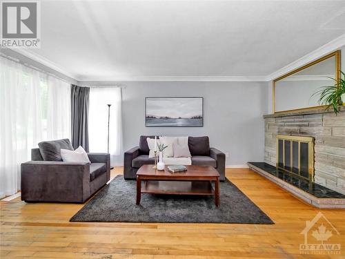 2576 Roman Avenue, Ottawa, ON - Indoor Photo Showing Living Room With Fireplace