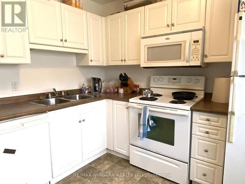 11 Duke Street, St. Catharines, ON - Indoor Photo Showing Kitchen With Double Sink