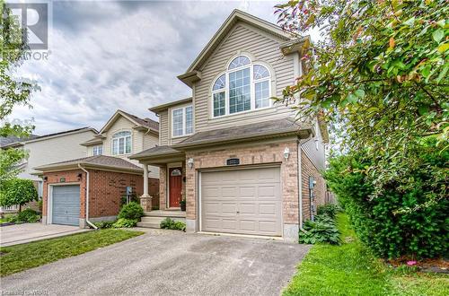 Side-by-side parking for 2 in the driveway, plus 1 more in the garage - 531 Commonwealth Crescent, Kitchener, ON - Outdoor With Facade
