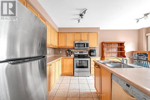 3 Mistycreek Crescent, Brampton, ON - Indoor Photo Showing Kitchen With Stainless Steel Kitchen With Double Sink