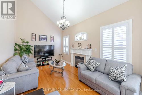5 Huntspoint Drive, Brampton, ON - Indoor Photo Showing Living Room With Fireplace