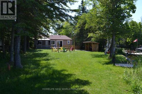 1391 Portage Road, Kawartha Lakes, ON - Outdoor With Backyard