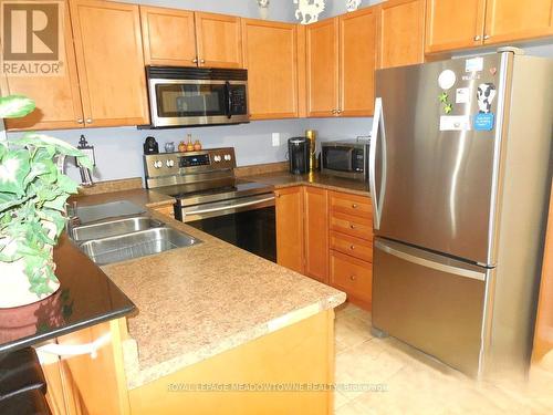 320 - 8 Harris Street, Cambridge, ON - Indoor Photo Showing Kitchen With Double Sink