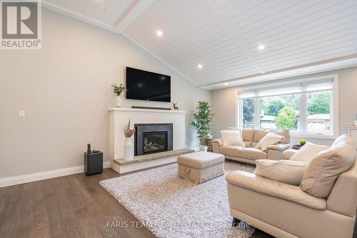 1171 North Shore Drive, Innisfil, ON - Indoor Photo Showing Living Room With Fireplace