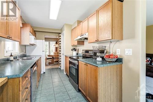 34 Wallsend Avenue, Kanata, ON - Indoor Photo Showing Kitchen With Double Sink