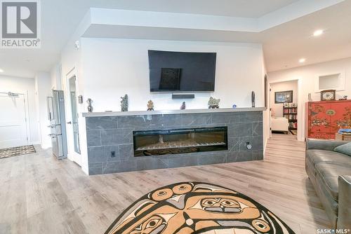 315 3581 Evans Court, Regina, SK - Indoor Photo Showing Living Room With Fireplace