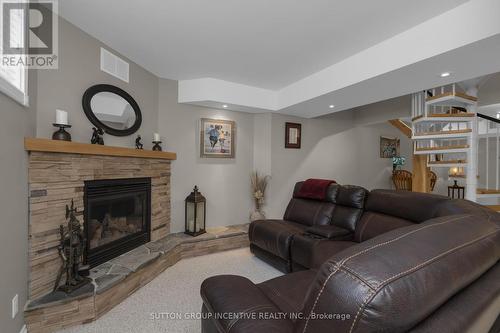 61 Highland Drive, Oro-Medonte, ON - Indoor Photo Showing Living Room With Fireplace