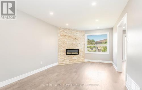 5145 Guildwood Way, Mississauga, ON - Indoor Photo Showing Other Room With Fireplace