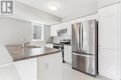 112 Lapland Private, Ottawa, ON - Indoor Photo Showing Kitchen With Double Sink