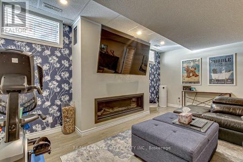 402 Larry Street, Central Elgin, ON - Indoor Photo Showing Living Room With Fireplace