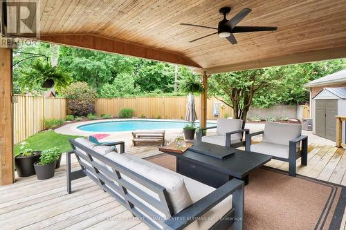 Solid Wood Kitchen - 1171 St Anthony Road, London, ON - Outdoor With In Ground Pool With Deck Patio Veranda With Exterior