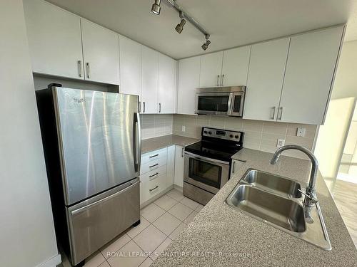 1105-3985 Grand Park Dr, Mississauga, ON - Indoor Photo Showing Kitchen With Stainless Steel Kitchen With Double Sink