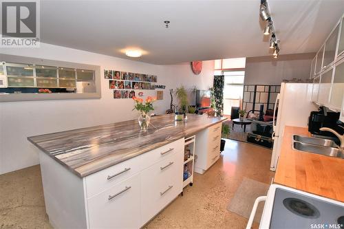 408 120 23Rd Street E, Saskatoon, SK - Indoor Photo Showing Kitchen With Double Sink