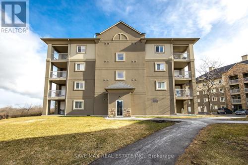 1416 - 8 Dayspring Circle, Brampton, ON - Outdoor With Facade