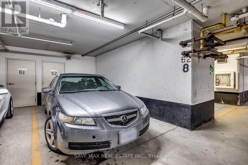 1416 - 8 Dayspring Circle, Brampton, ON - Indoor Photo Showing Garage