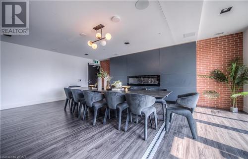 15 Wellington Street Unit# 2101, Kitchener, ON - Indoor Photo Showing Dining Room With Fireplace