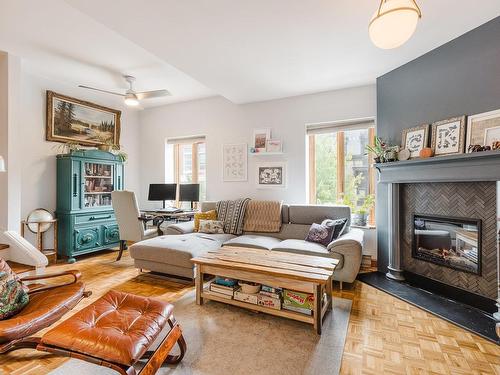 Living room - 1775 Rue St-André, Montréal (Ville-Marie), QC - Indoor Photo Showing Living Room With Fireplace