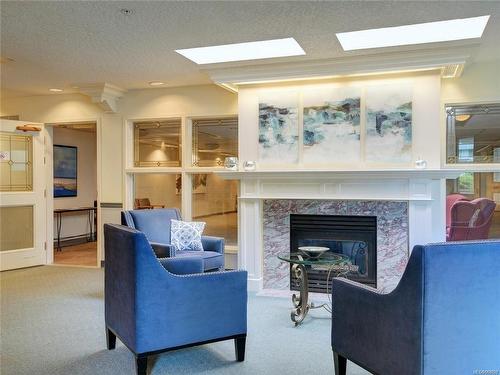 315-1521 Church Ave, Saanich, BC - Indoor Photo Showing Living Room With Fireplace