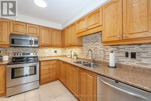 121 Lavery Heights, Milton, ON - Indoor Photo Showing Kitchen With Double Sink