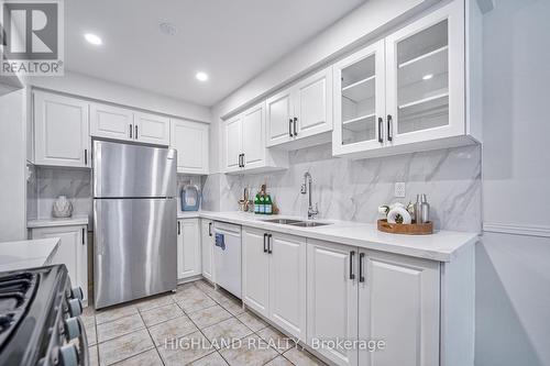 18 - 2051 Merchants Gate, Oakville, ON - Indoor Photo Showing Kitchen With Double Sink