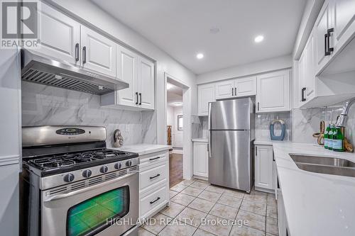 18 - 2051 Merchants Gate, Oakville, ON - Indoor Photo Showing Kitchen With Double Sink