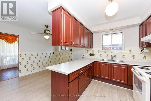 11 Clement Road, Toronto, ON - Indoor Photo Showing Kitchen With Double Sink