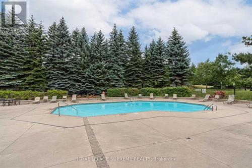 903 - 10 Laurelcrest Street N, Brampton, ON - Outdoor With In Ground Pool