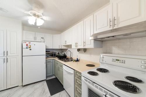 640 West Street|Unit #1101, Brantford, ON - Indoor Photo Showing Kitchen With Double Sink