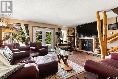 40 James Bay, Lumsden, SK - Indoor Photo Showing Living Room With Fireplace