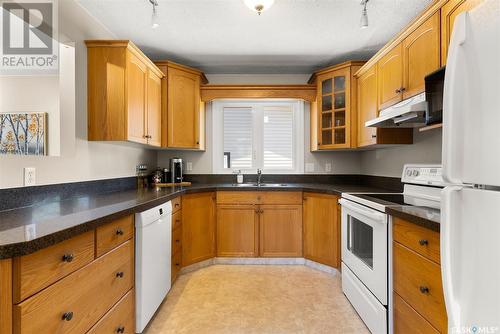 163 Bothwell Crescent, Regina, SK - Indoor Photo Showing Kitchen With Double Sink