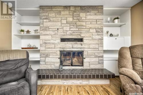 1202 Cowan Drive, Prince Albert, SK - Indoor Photo Showing Living Room With Fireplace