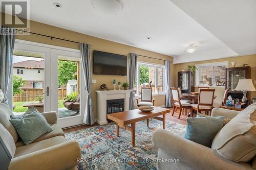 8 Brookfield Avenue, Ingersoll (Ingersoll - South), ON - Indoor Photo Showing Living Room With Fireplace