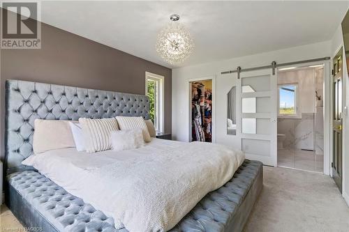 Master bedroom with ensuite and walk in closet - 166 Maple Hill Road, Brockton, ON - Indoor Photo Showing Bedroom