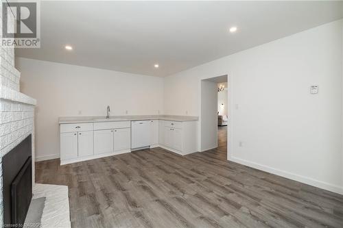 1245 East Road, Northern Bruce Peninsula, ON - Indoor Photo Showing Other Room With Fireplace