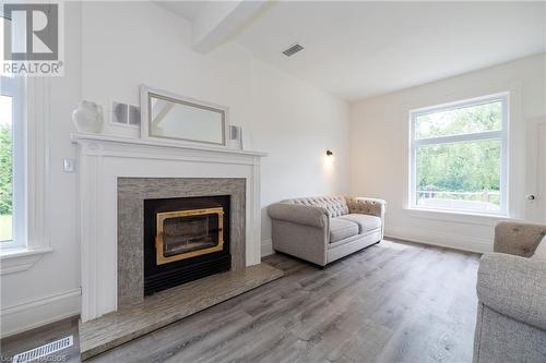 1245 East Road, Northern Bruce Peninsula, ON - Indoor Photo Showing Living Room With Fireplace