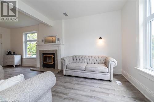 1245 East Road, Northern Bruce Peninsula, ON - Indoor Photo Showing Living Room With Fireplace