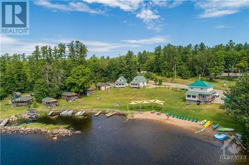 Aerial View of Property, 4 Houses & 5 Cabins. - 5253 Calabogie Road, Calabogie, ON - Outdoor With Body Of Water With View