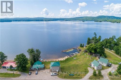 5253 Calabogie Road, Greater Madawaska, ON - Outdoor With Body Of Water With View