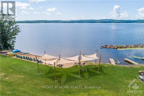 5253 Calabogie Road, Greater Madawaska, ON - Outdoor With Body Of Water With View