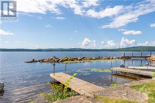 5253 Calabogie Road, Greater Madawaska, ON - Outdoor With Body Of Water With View