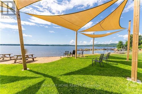 5253 Calabogie Road, Greater Madawaska, ON - Outdoor With Body Of Water With View