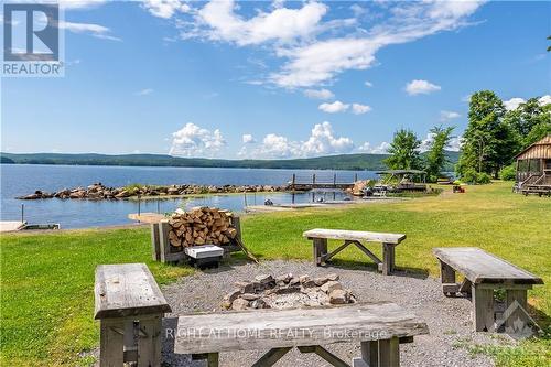 5253 Calabogie Road, Greater Madawaska, ON - Outdoor With Body Of Water With View